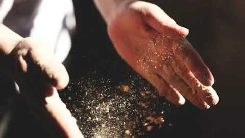 Dusty hands (Photo by Austin Ban on Unsplash)