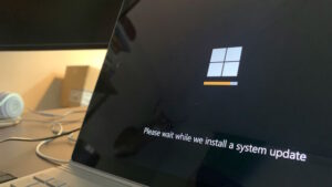 A Windows laptop running updates (Photo by Clint Patterson on Unsplash)